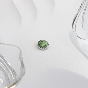 Top dentado biselado